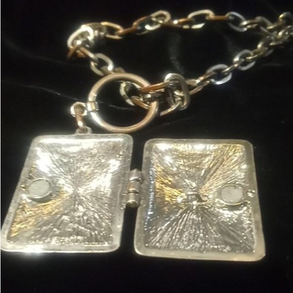 Silver tone necklace with locket